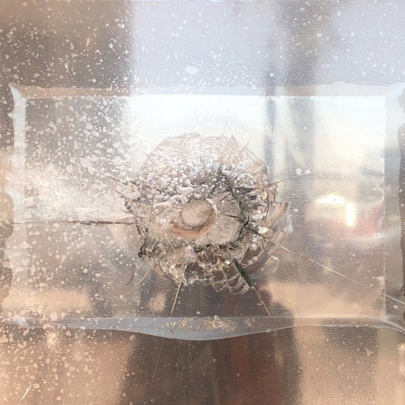 Newcastle-BulletHoleInGlass